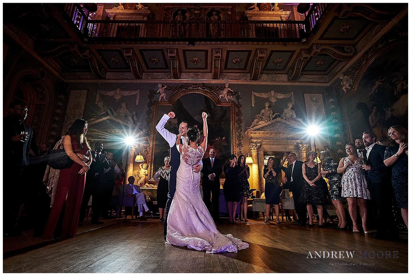 first dance at wedding epic shot with flash cheering couple moor park wedding venue