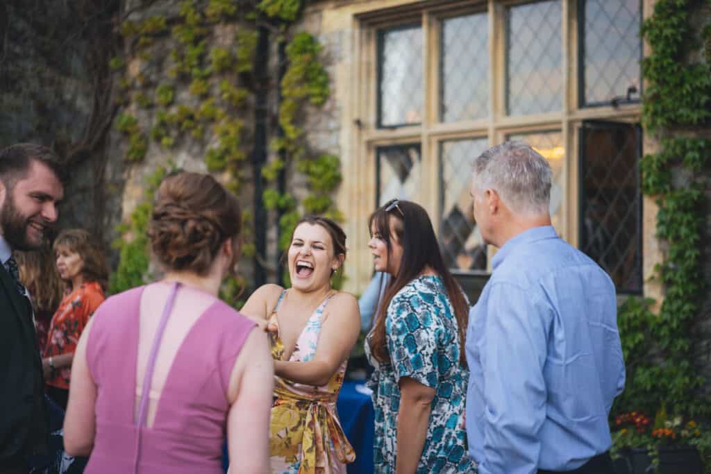 Eastwell Manor wedding guests having fun at reception