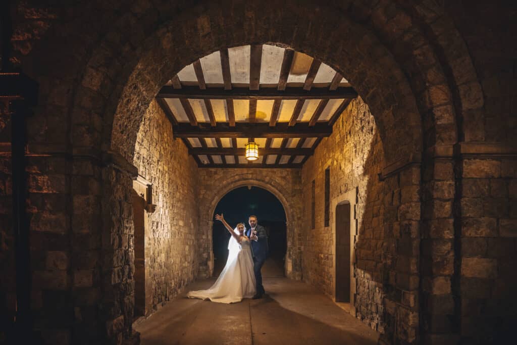 Eastwell Manor wedding bride and groom photograph at night