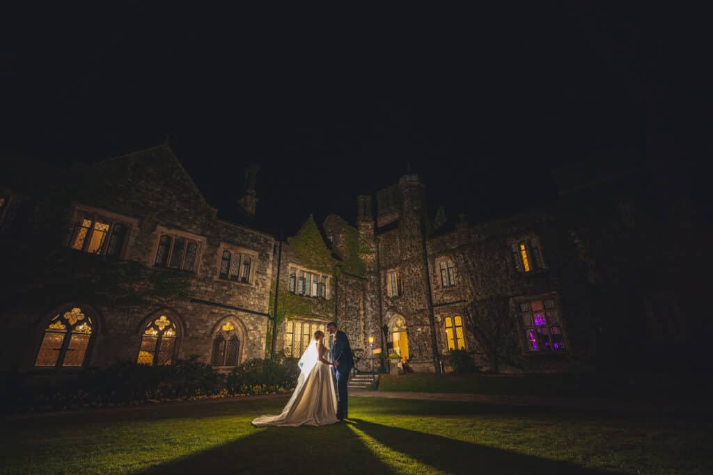 Eastwell Manor wedding bride and groom photograph at night