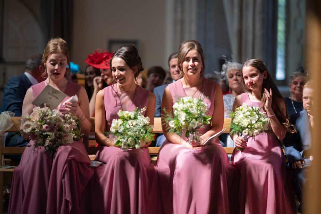 Bridesmaids in church beautiful pink dresses
