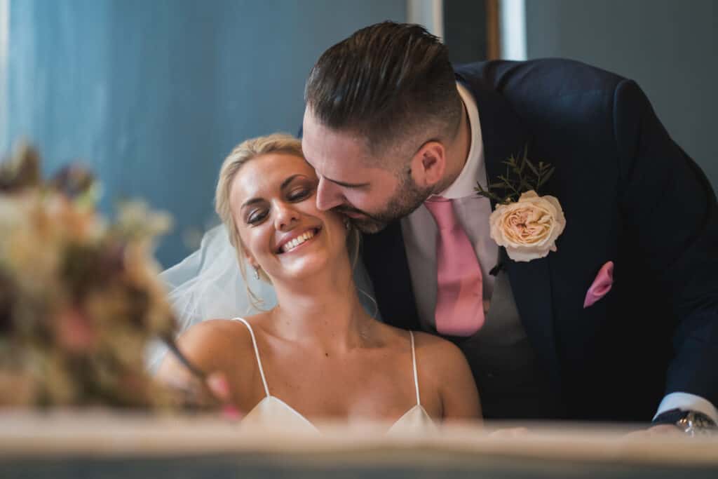 bride and groom register