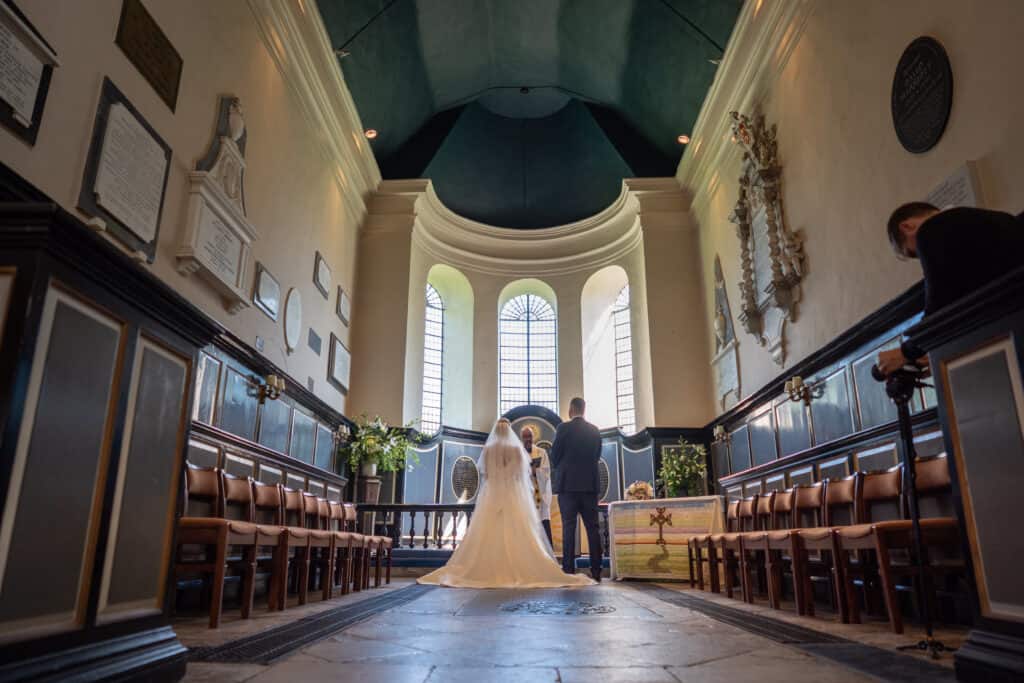 Church wedding ceremony at St Gregory & St Martin's Church in Wye