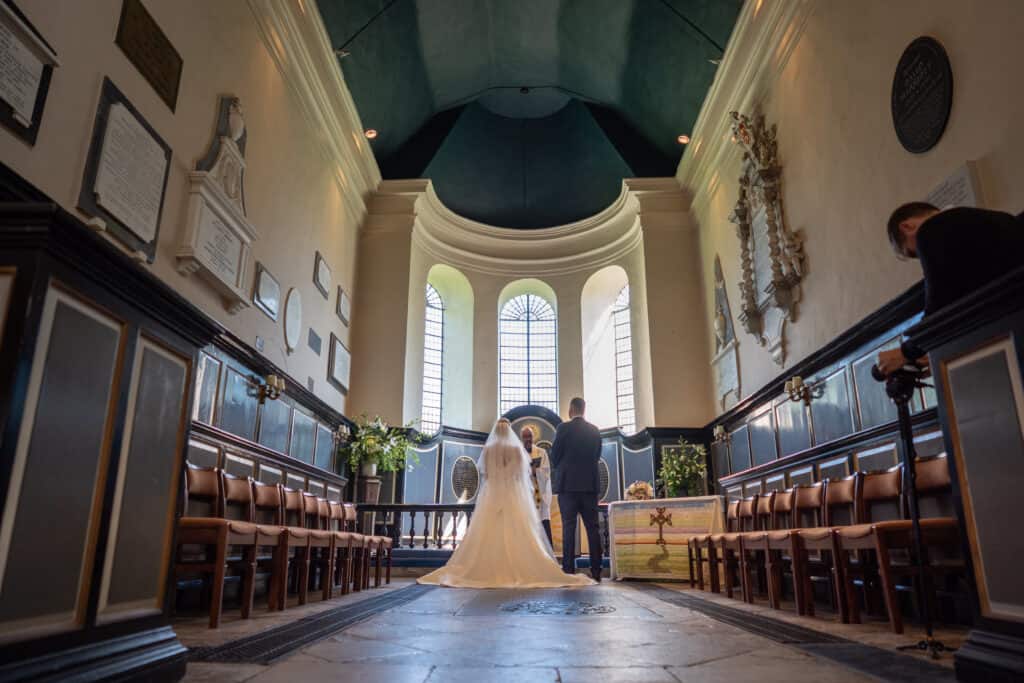 Church wedding ceremony at St Gregory & St Martin's Church in Wye