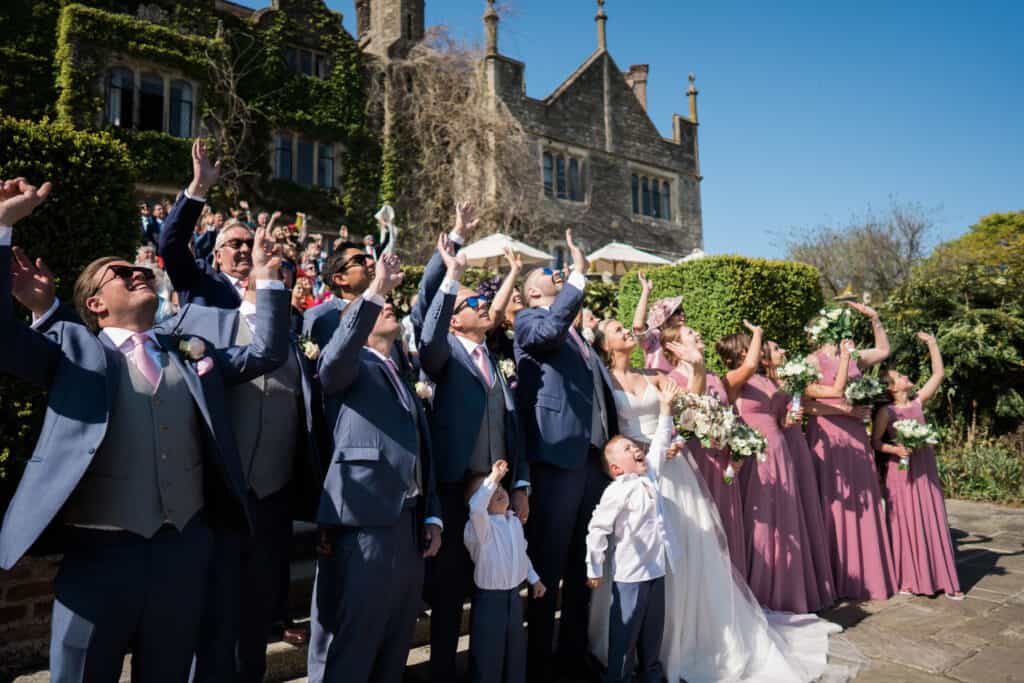 Eastwell Manor wedding group photograph of wedding party and guests