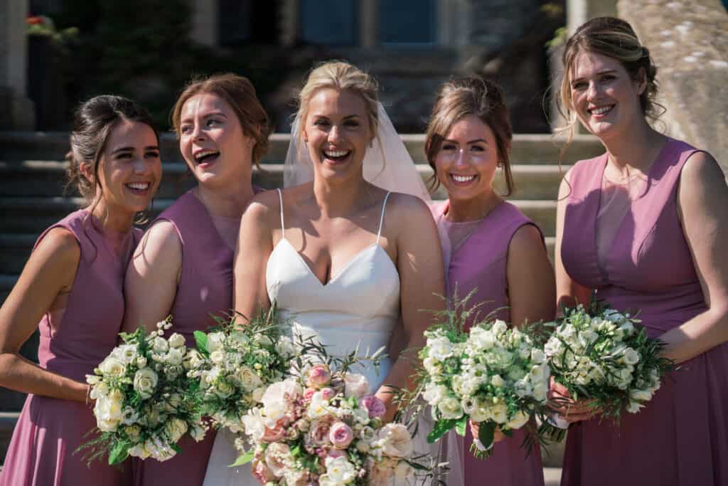 Bride and bridesmaids with their beautiful flowers
