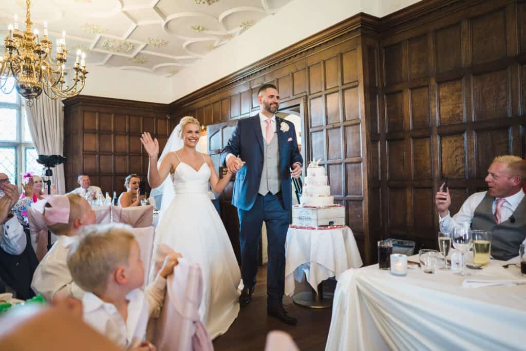 Bride and groom entering the room