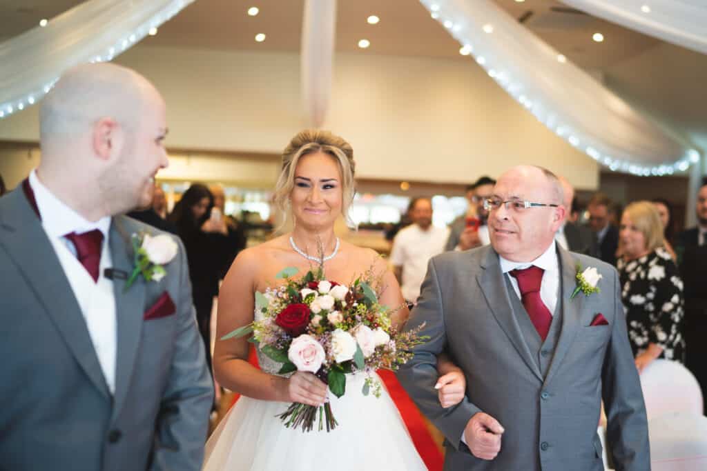 Bride coming down the aisle Weald of Kent Wedding