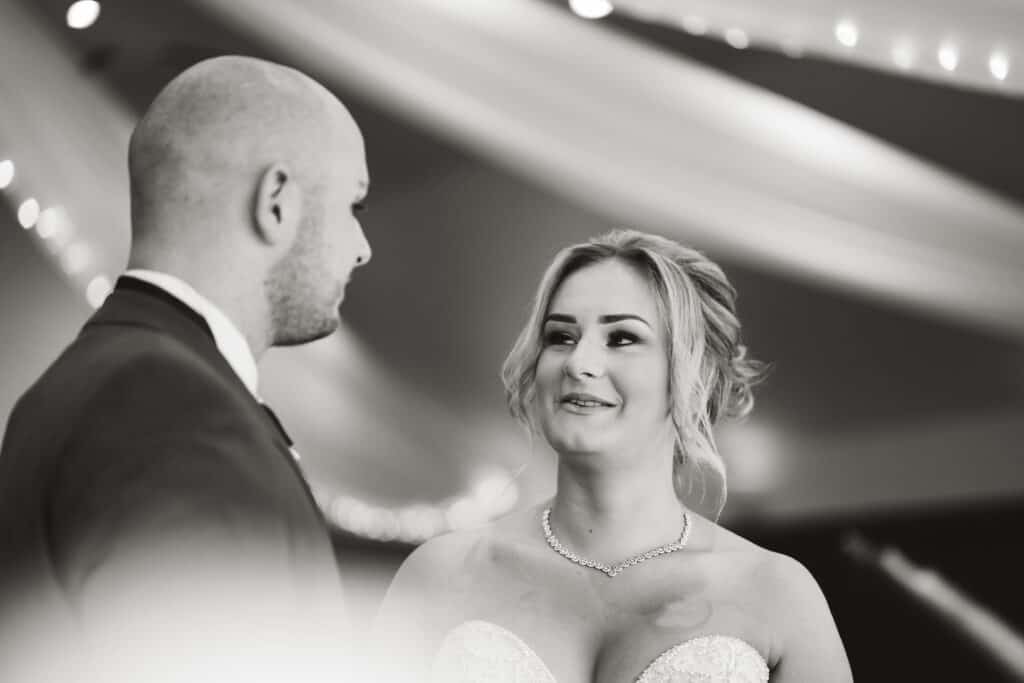 Black and white bride and groom photograph