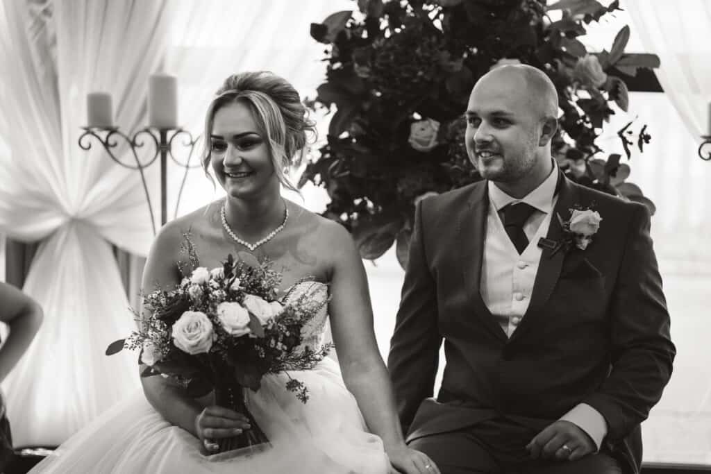 Black and white bride and groom photograph