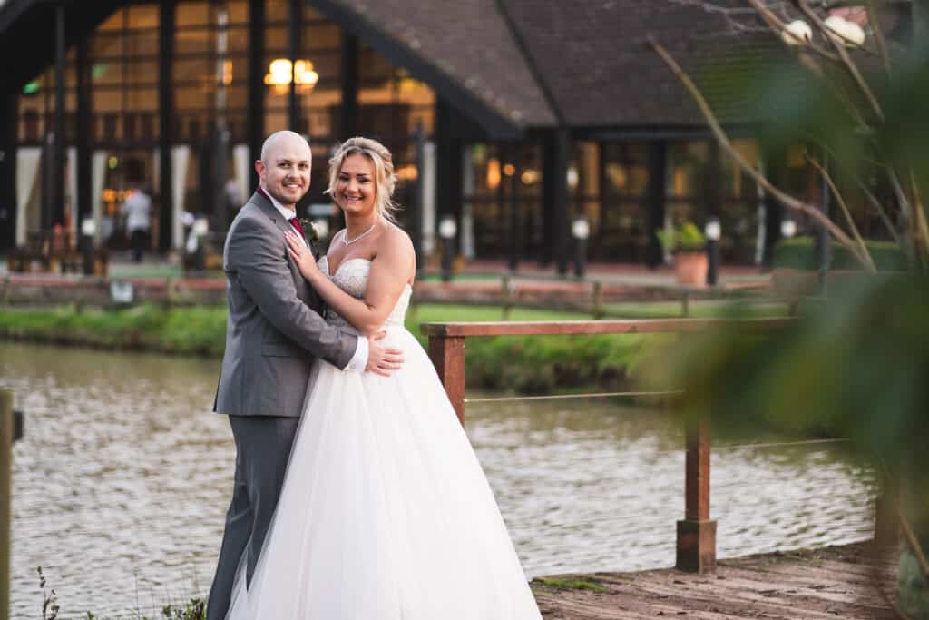 Bride and groom portrait photography on grounds of Weald of Kent wedding venue