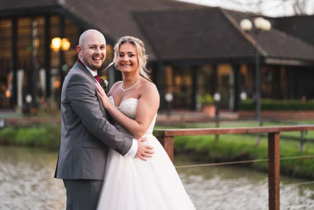 Bride and groom portrait photography on grounds of Weald of Kent wedding venue