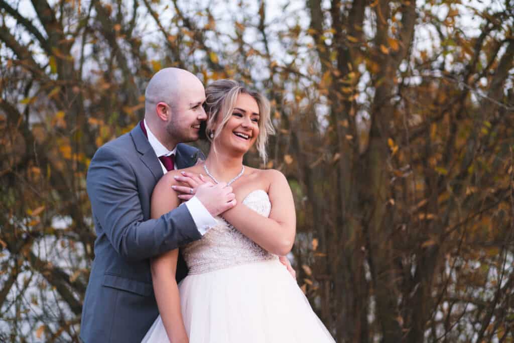 Bride and groom portrait photography on grounds of Weald of Kent wedding venue