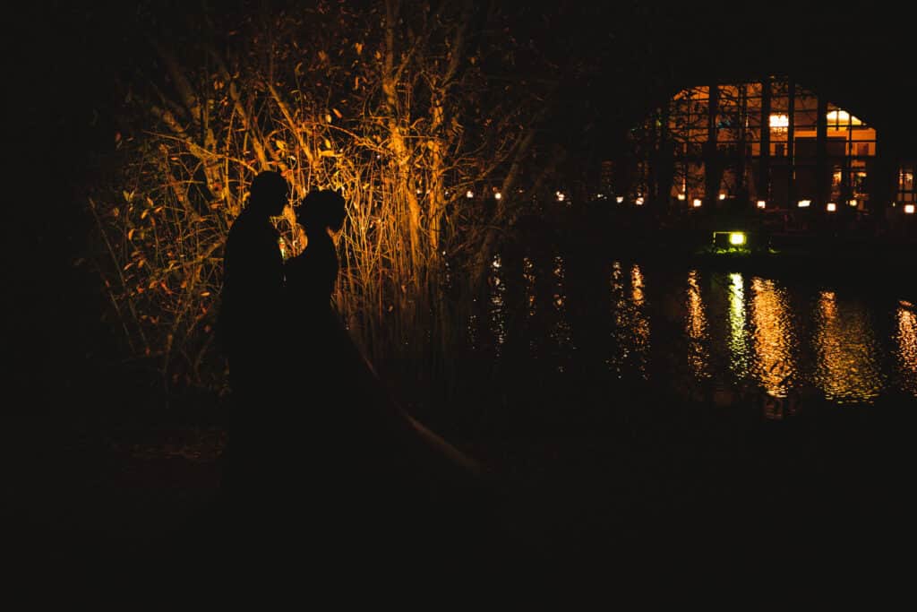 Bride and groom silhouette photography on grounds of Weald of Kent wedding venue