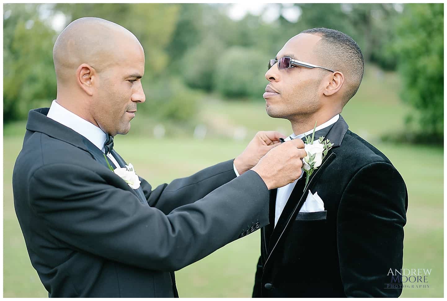 best man helping groom on wedding day Andrew Moore Photography