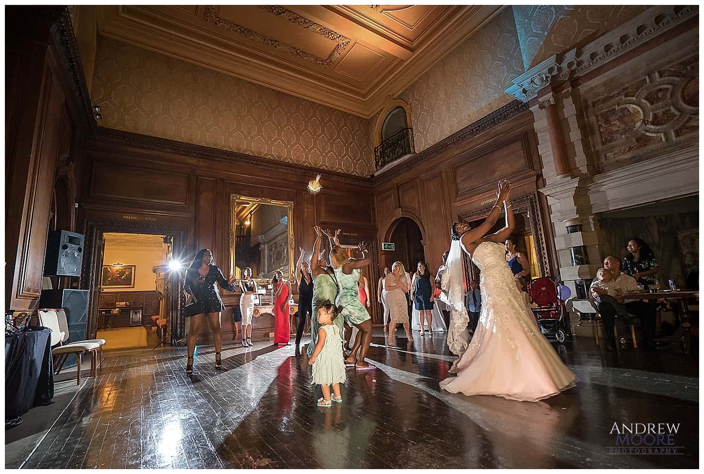 bride throwing bouquet at surrey wedding 