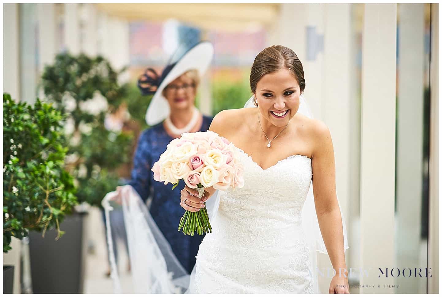 stunning white wedding dress with smiling bride four season hotel 