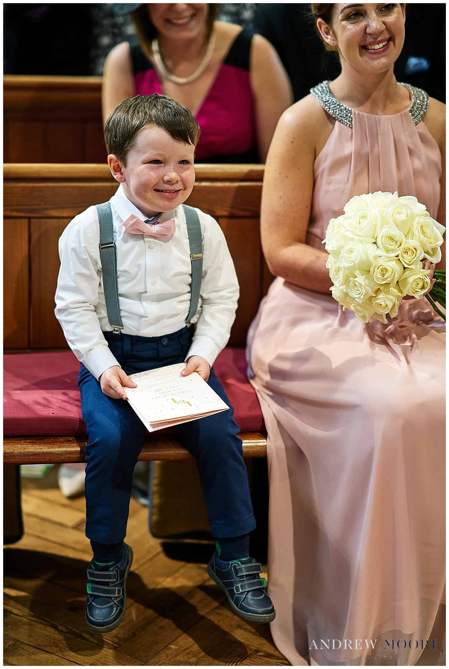 little boy with braces at wedding grayshot church and cain manor surrey 