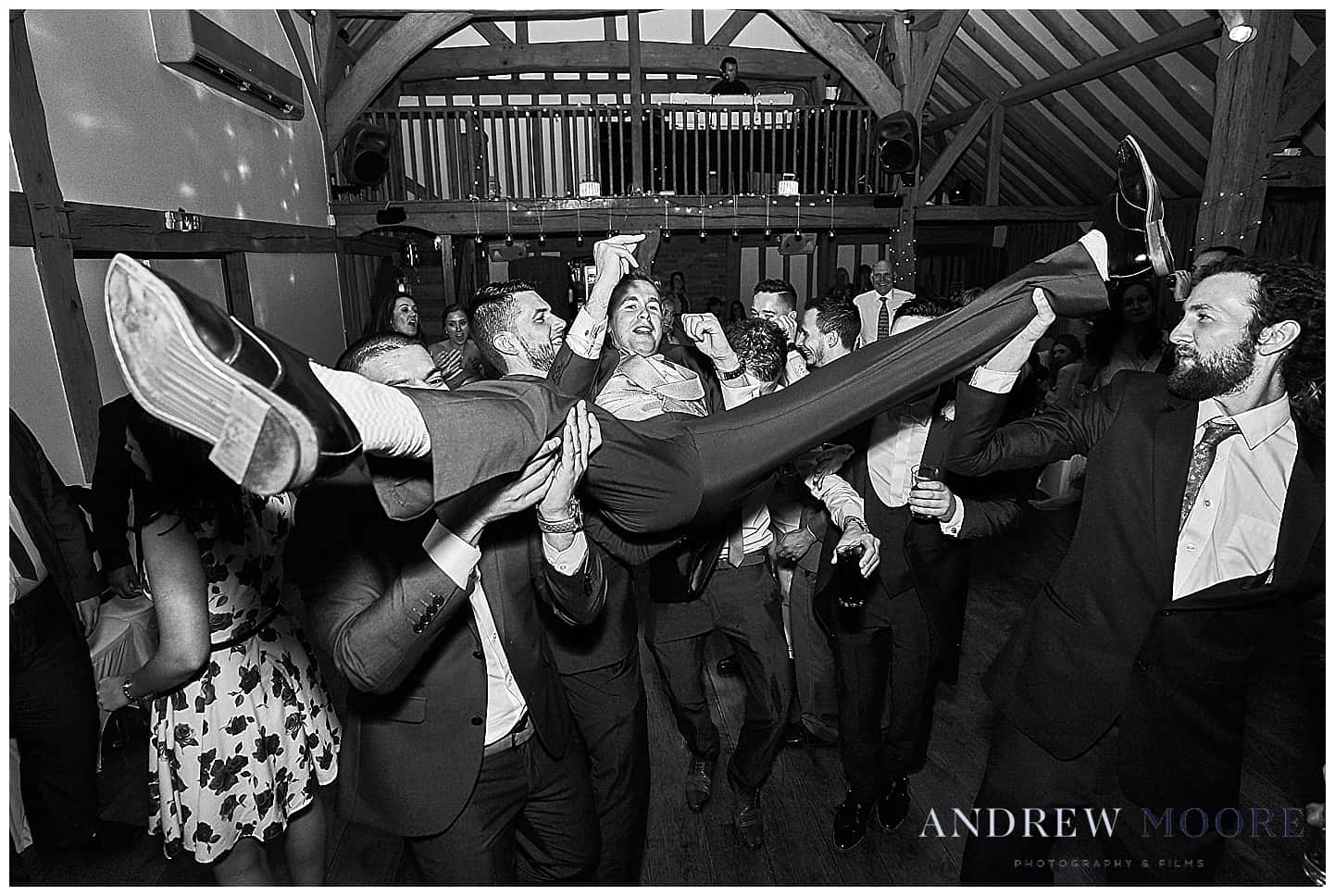 Groom held up dancing at Cain Manor black and white preset