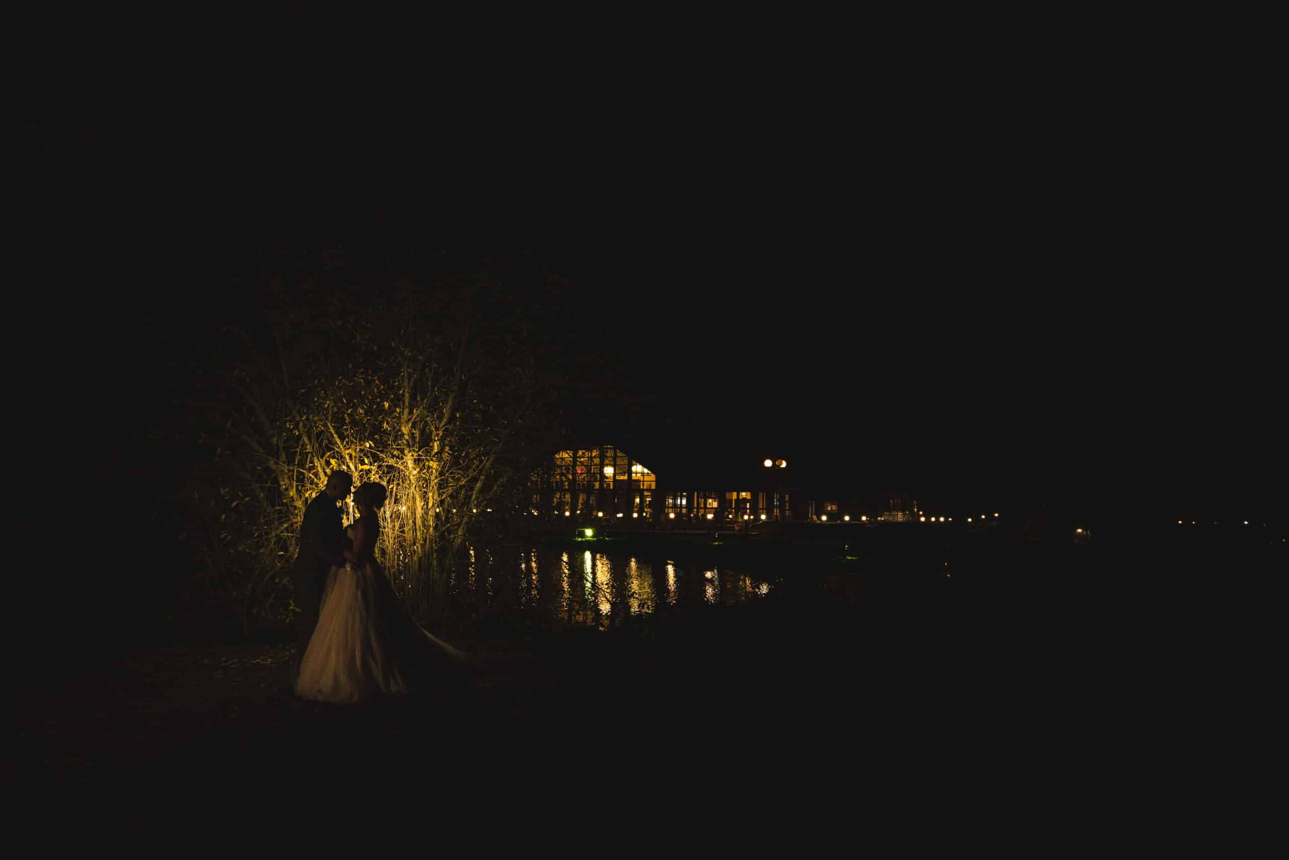 Bride and groom silhouette photography on grounds of Weald of Kent wedding venue